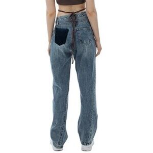 ann andelman pink leather patch twisted jeans blue